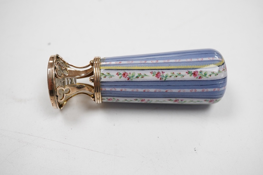 A late 19th century yellow metal and polychrome enamel desk seal, with rock crystal matrix, carved with a monogram, 69mm (small chip to the enamel), in original J.C Vickery fitted gilt tooled leather box.